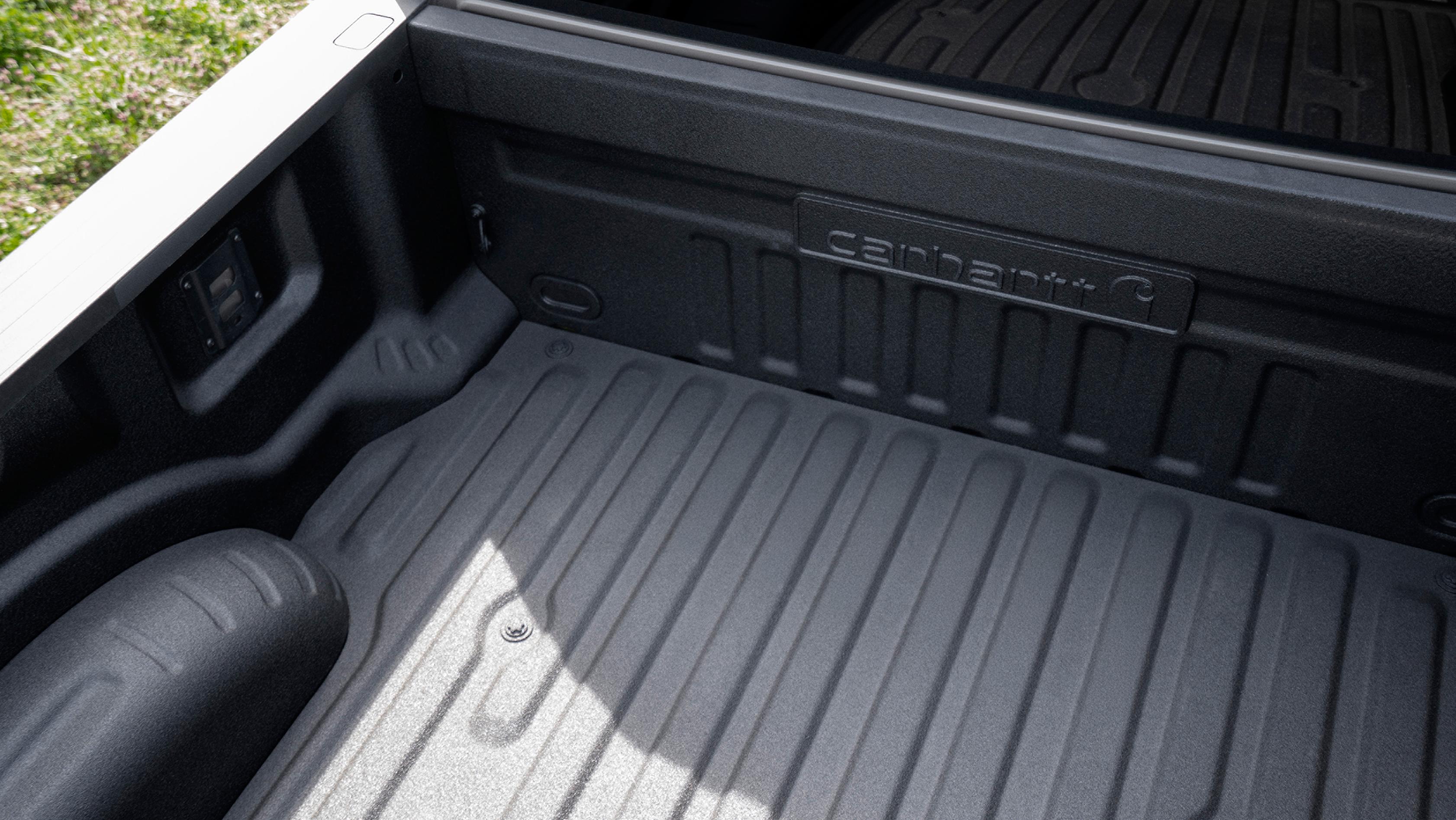 Vue intérieure du plateau du modèle Ford Super Duty® F-350® XLT 2027 équipé de l'ensemble Super Duty Carhartt®