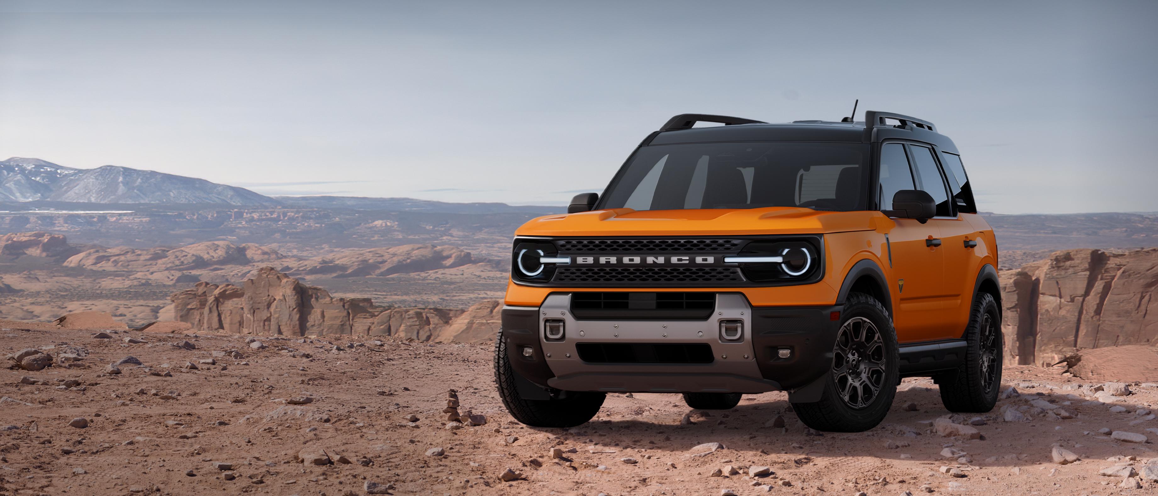 VUS Ford Bronco Sport® Badlands® 2026 stationné sur la terre avec des falaises rocheuses en arrière-plan