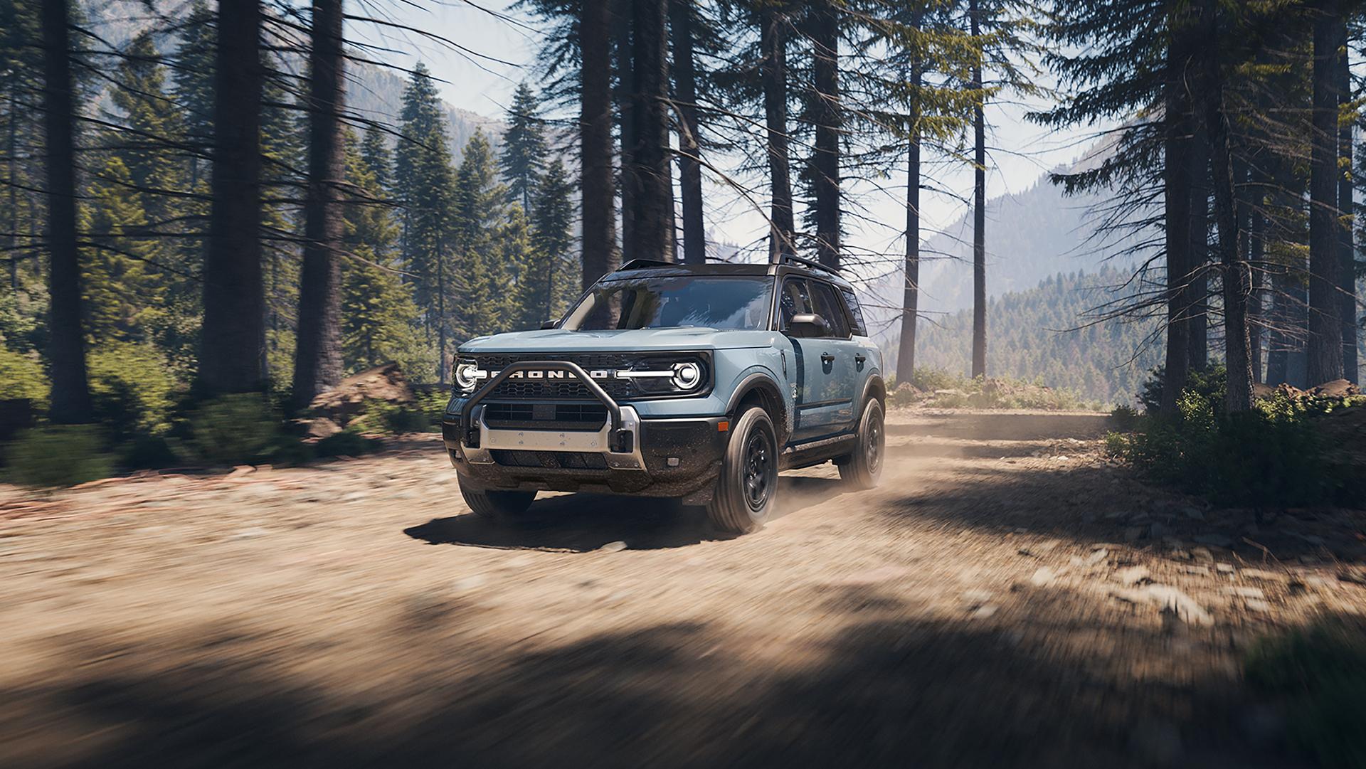 Un VUS Ford Bronco Sport® 2026 roulant sur un chemin de terre