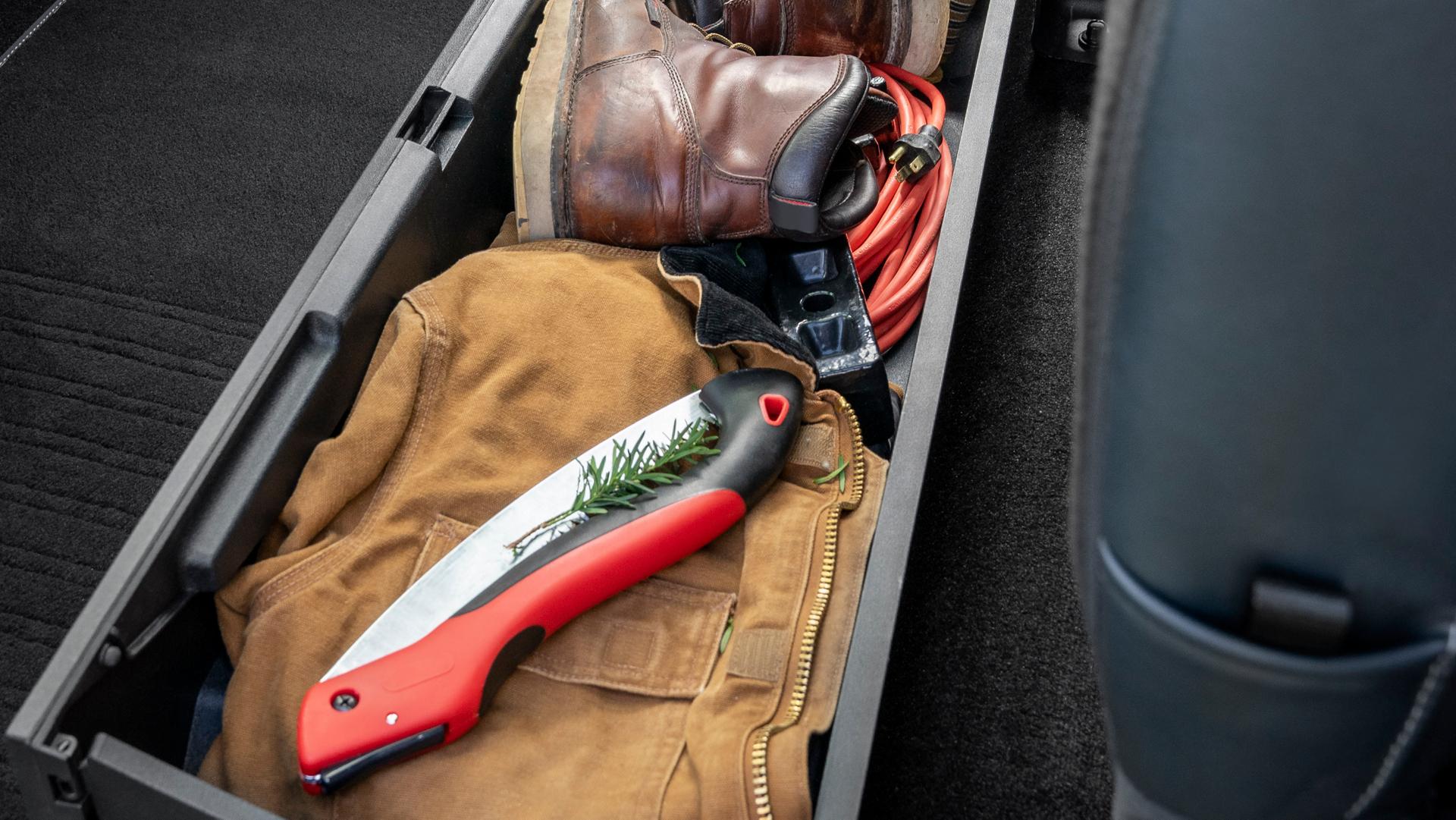 Rangement sous le siège du Ford Super Duty® à châssis-cabine 2026