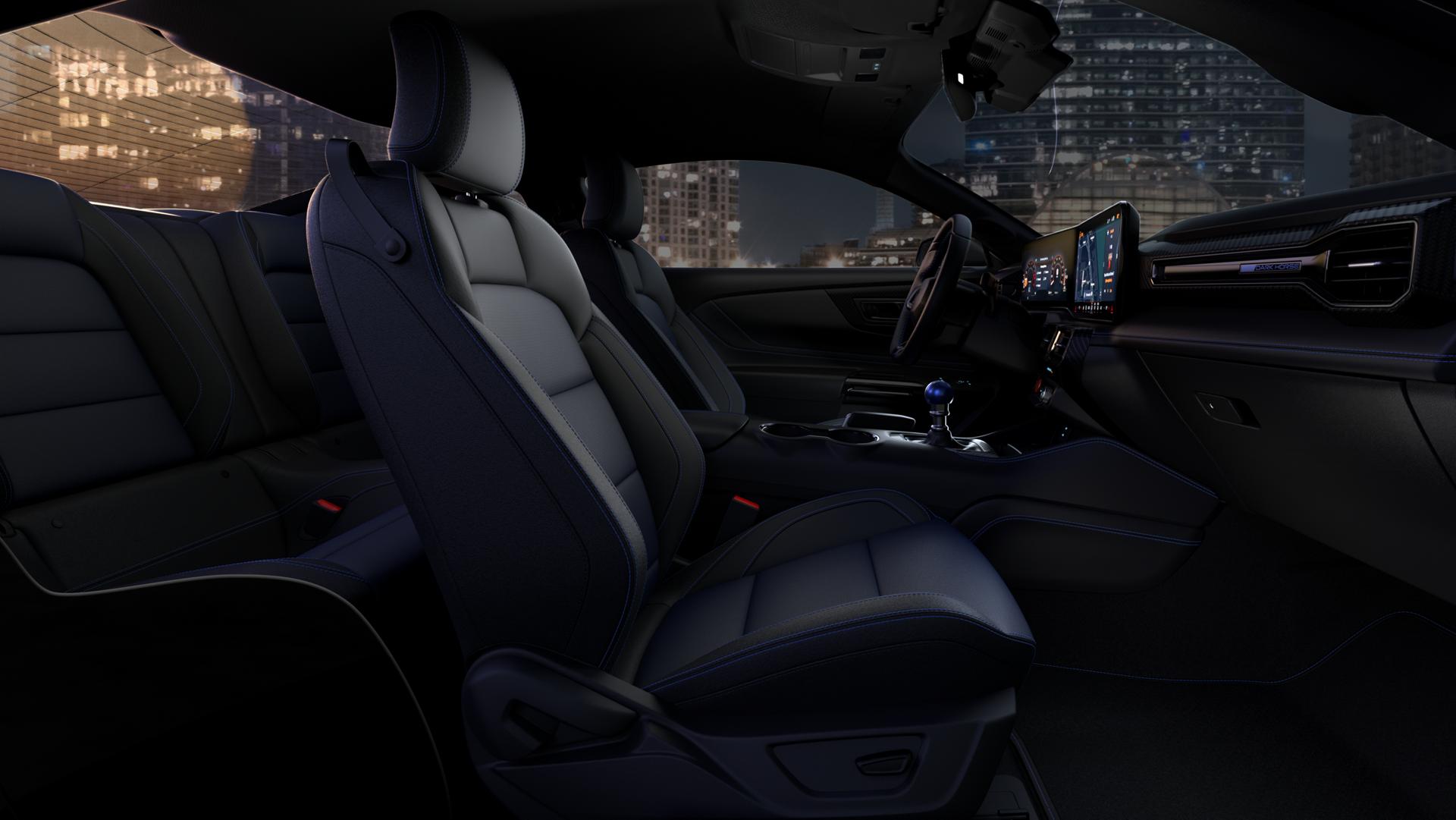 Intérieur de la Ford Mustang® Dark Horse™ 2025 montrant le tissu noir en option avec des accents bleus